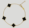 Bracciale donna quadrifoglio nero oro 18kt